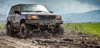 Off road vehicle splashed mud